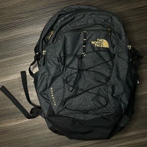 THE NORTH FACE black/gold unisex backpack